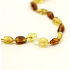 Pupiņu formas medus un konjaka krāsas pulēta dzintara krelles 